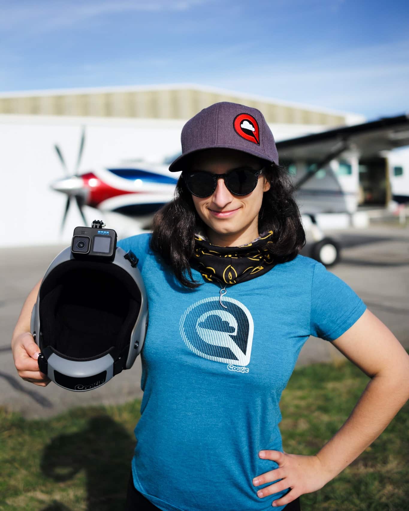 Girl holding a gray Cookie helmet